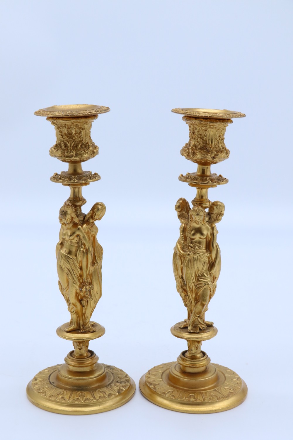 A superb pair of 19th century classical gilt bronze candlesticks. View II