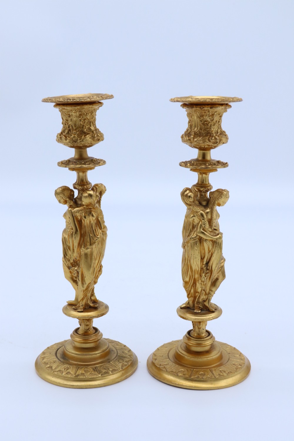 A superb pair of 19th century classical gilt bronze candlesticks. View III