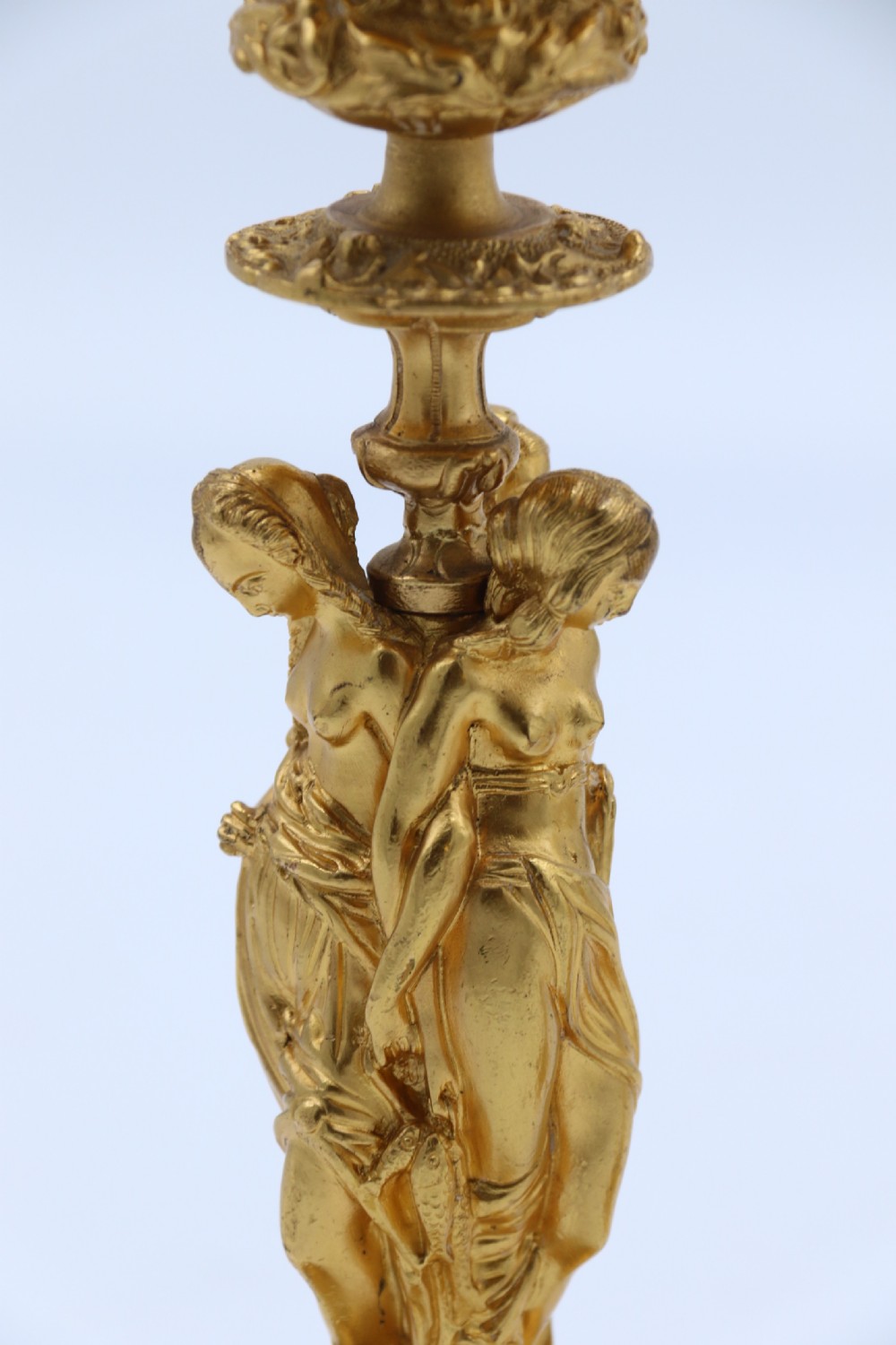 A superb pair of 19th century classical gilt bronze candlesticks. View VI