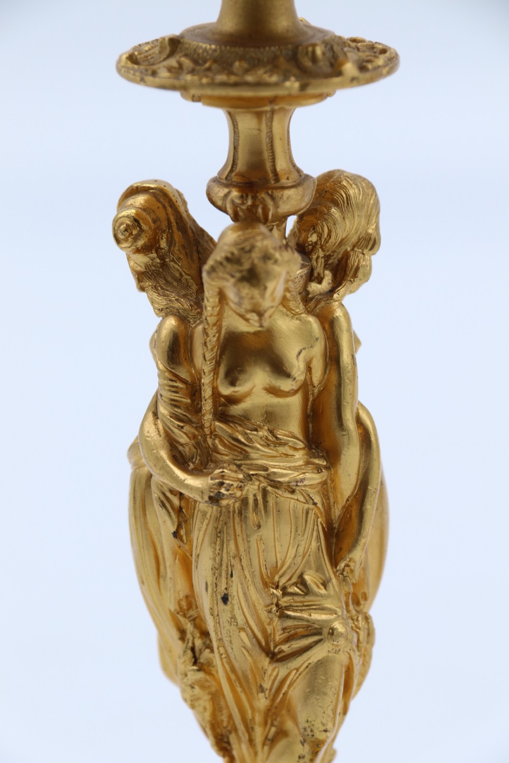 A superb pair of 19th century classical gilt bronze candlesticks. View VIII