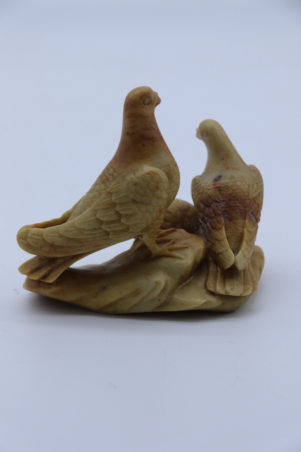 A superb 19th century Chinese soapstone carved figure group of three pigeons View VI