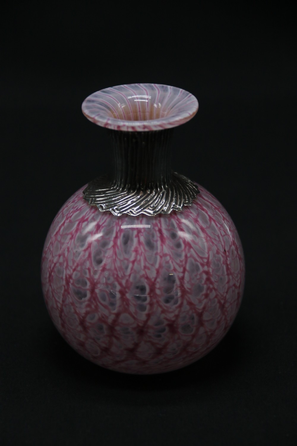 A most unusual 1930s art glass and silver mounted perfume bottle. View IV