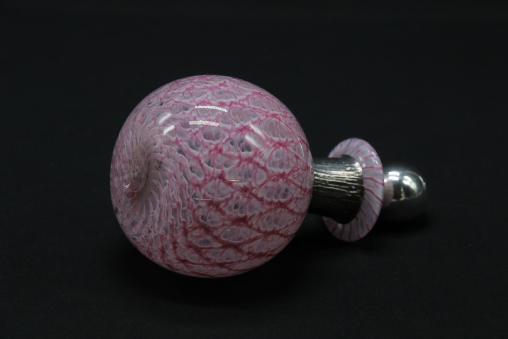 A most unusual 1930s art glass and silver mounted perfume bottle. View VII