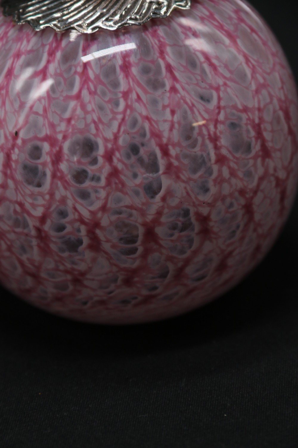 A most unusual 1930s art glass and silver mounted perfume bottle. View X