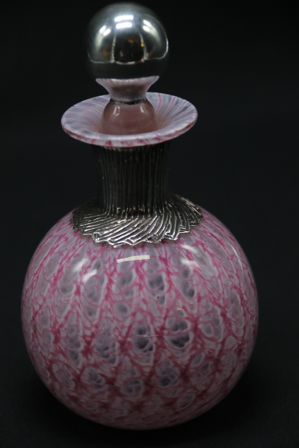 A most unusual 1930s art glass and silver mounted perfume bottle. View XI