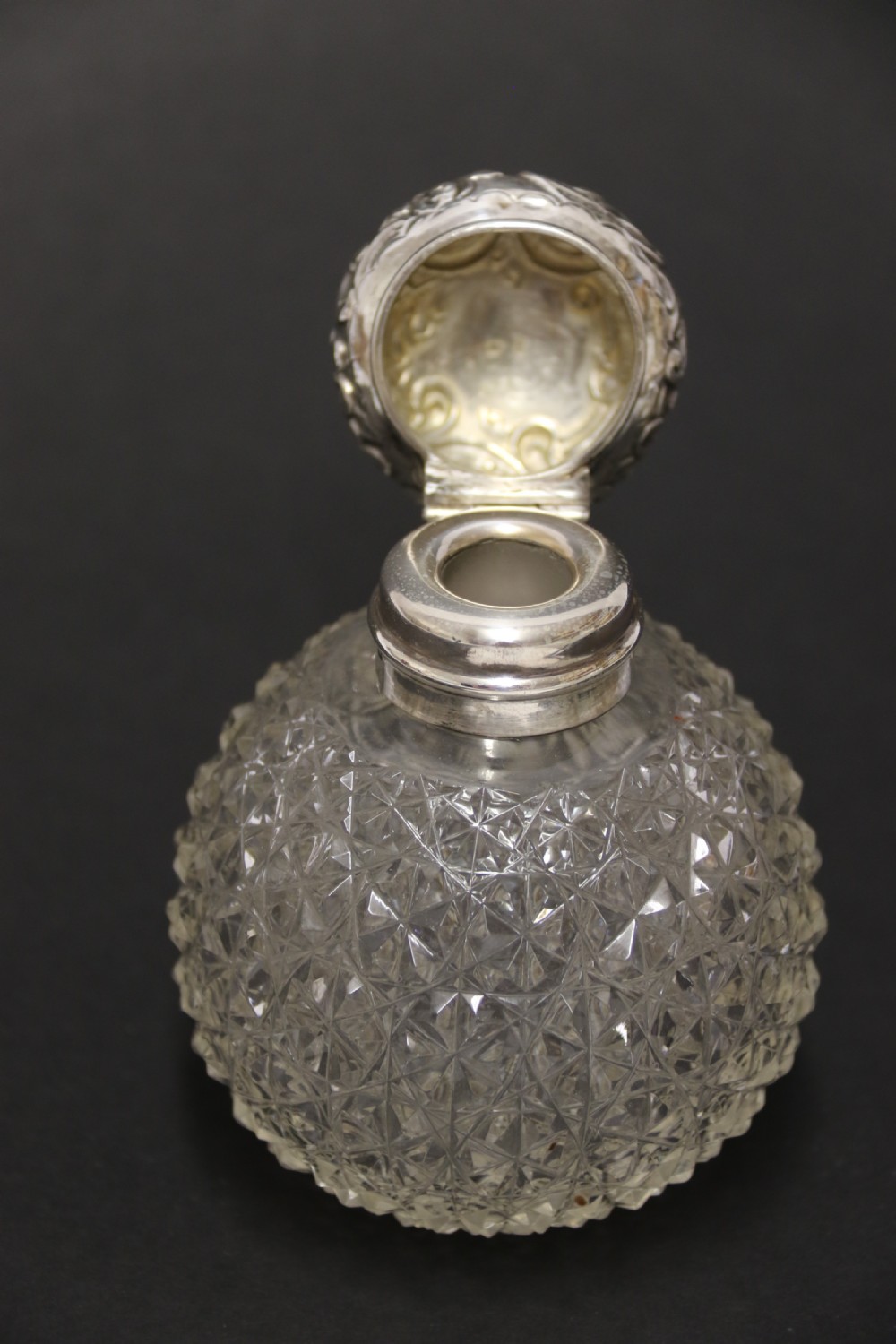 A good quality Victorian silver and cut glass perfume bottle  View III