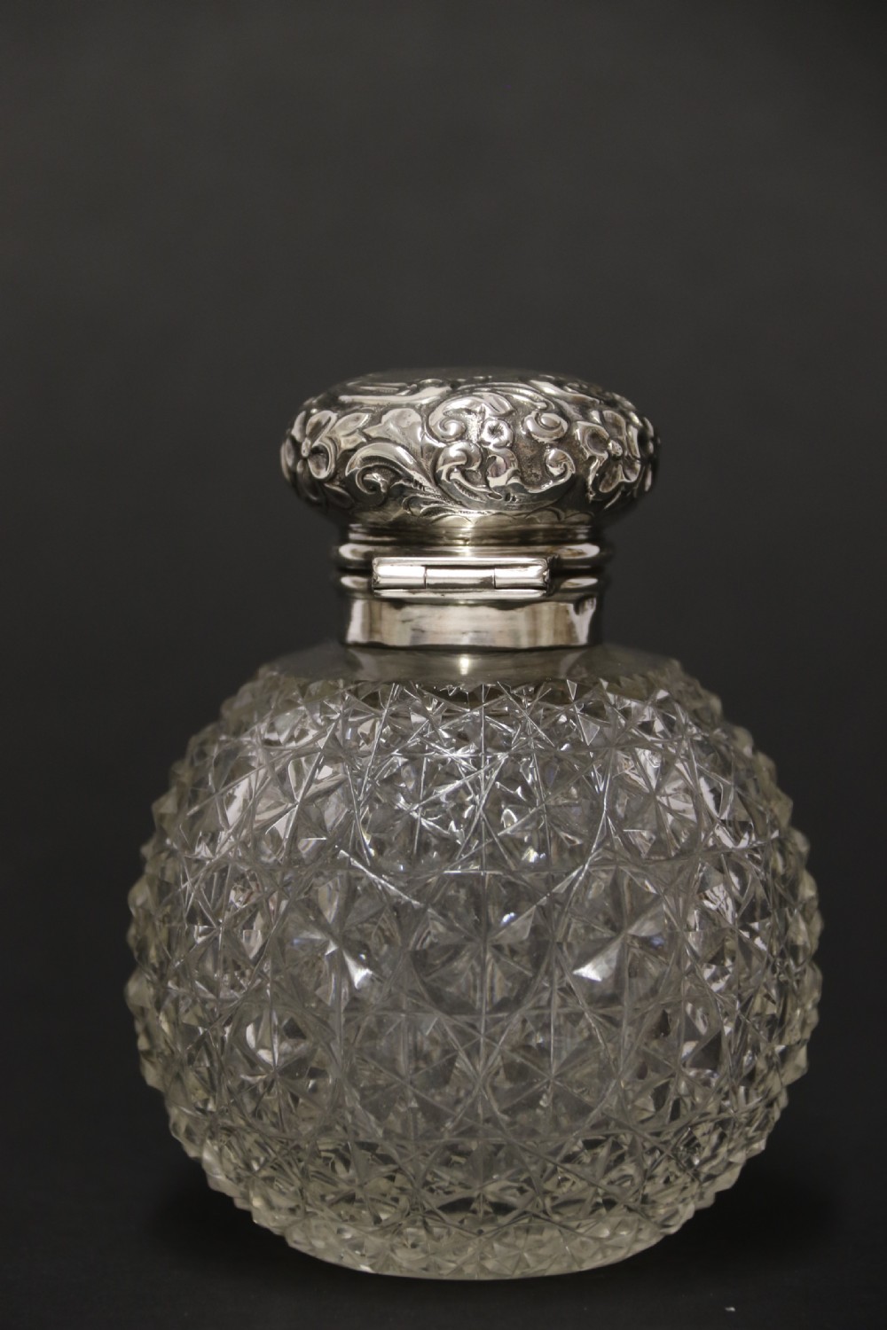 A good quality Victorian silver and cut glass perfume bottle  View IV