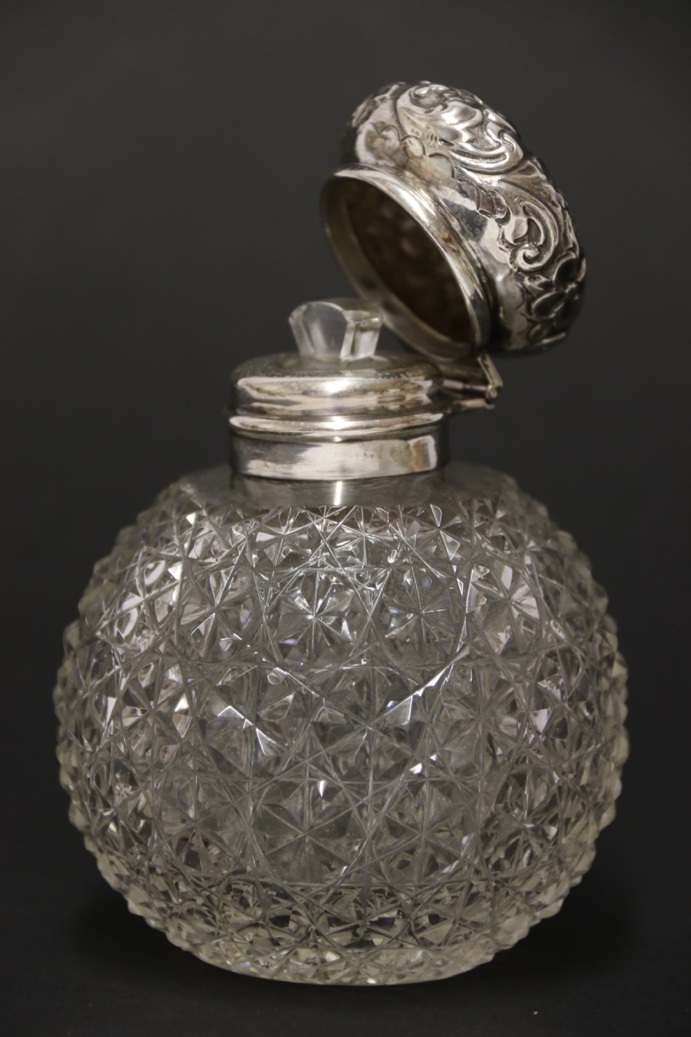 A good quality Victorian silver and cut glass perfume bottle  View VII