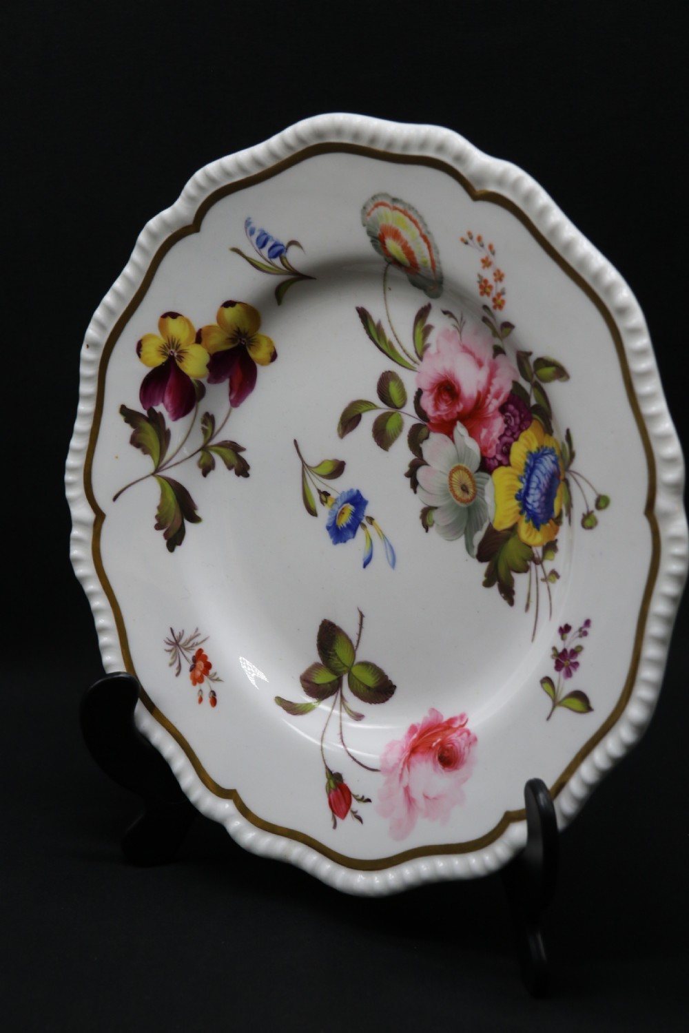 A rare hand painted floral plate from the English Daniel porcelain factory, circa 1825



 View X