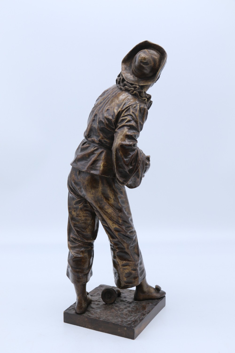 A fine French Bronze sculpture of a Pierrot singing and playing the lute by Bornet.  View V