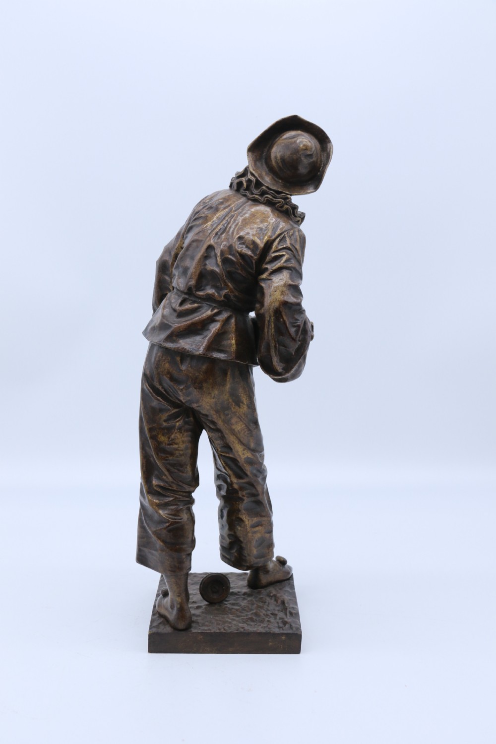 A fine French Bronze sculpture of a Pierrot singing and playing the lute by Bornet.  View VI