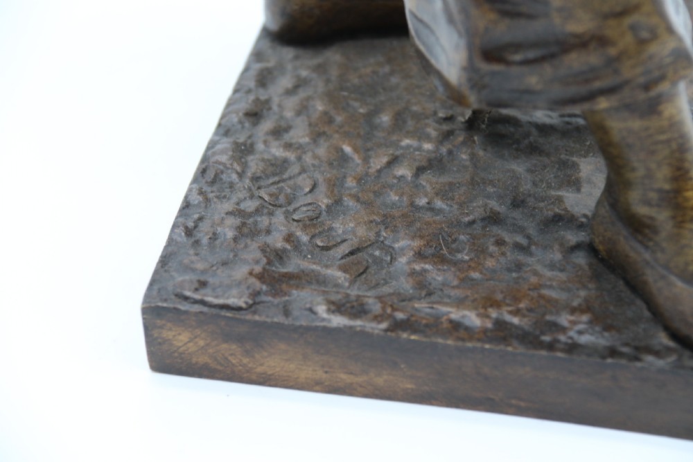 A fine French Bronze sculpture of a Pierrot singing and playing the lute by Bornet.  View XIV