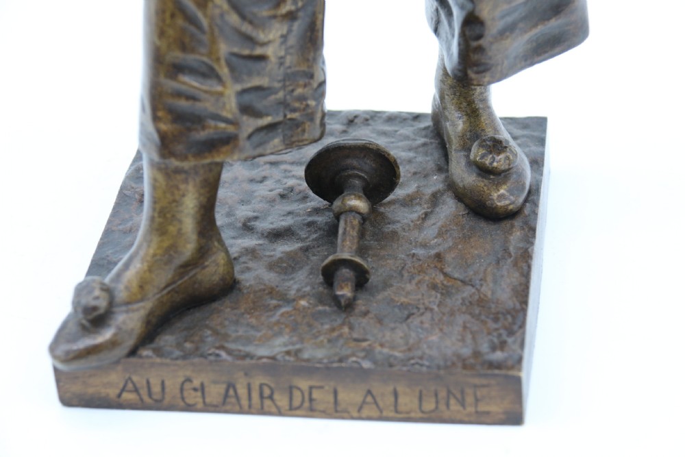 A fine French Bronze sculpture of a Pierrot singing and playing the lute by Bornet.  View XV