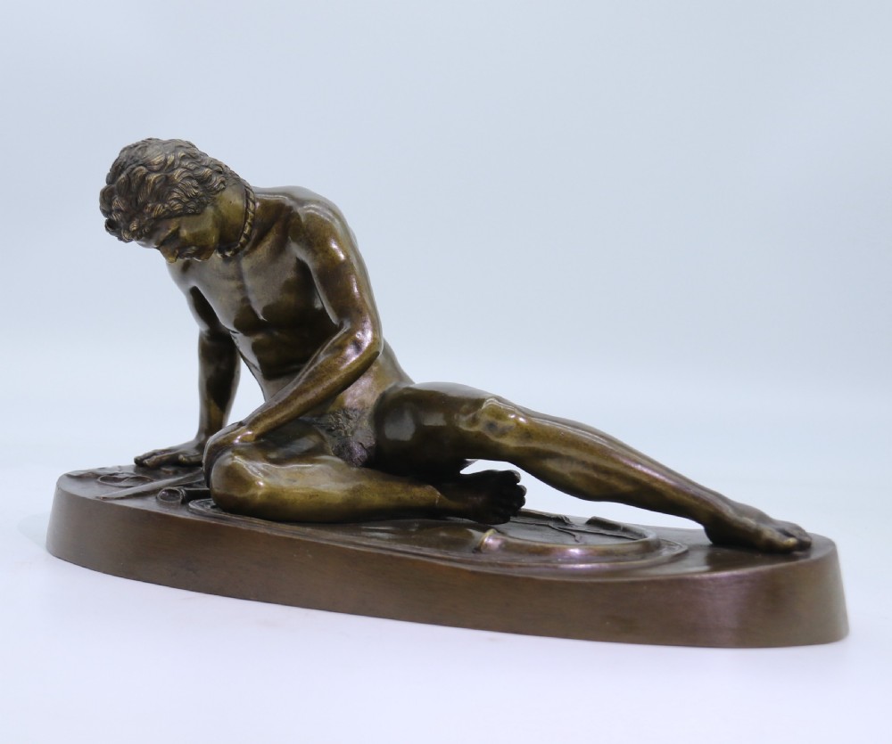 A fine mid 19th century Italian Grand Tour bronze study taken from the antique the dying Gaul.
