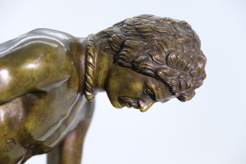 A fine mid 19th century Italian Grand Tour bronze study taken from the antique the dying Gaul. View IV