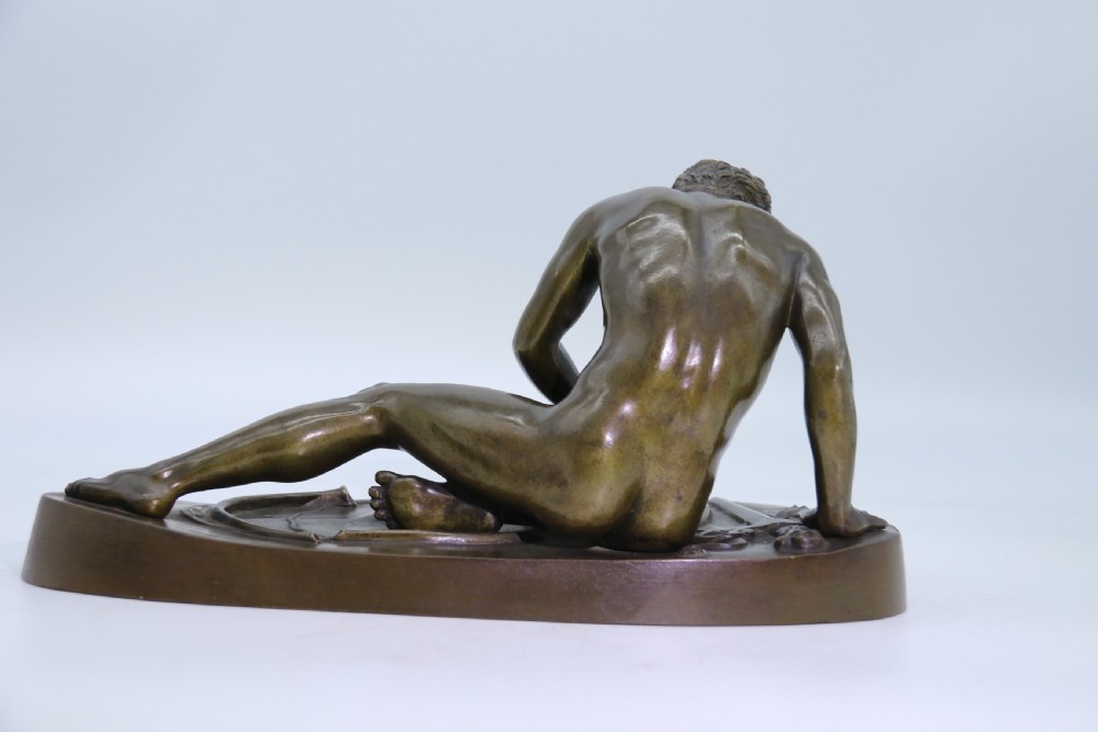 A fine mid 19th century Italian Grand Tour bronze study taken from the antique the dying Gaul. View XIX