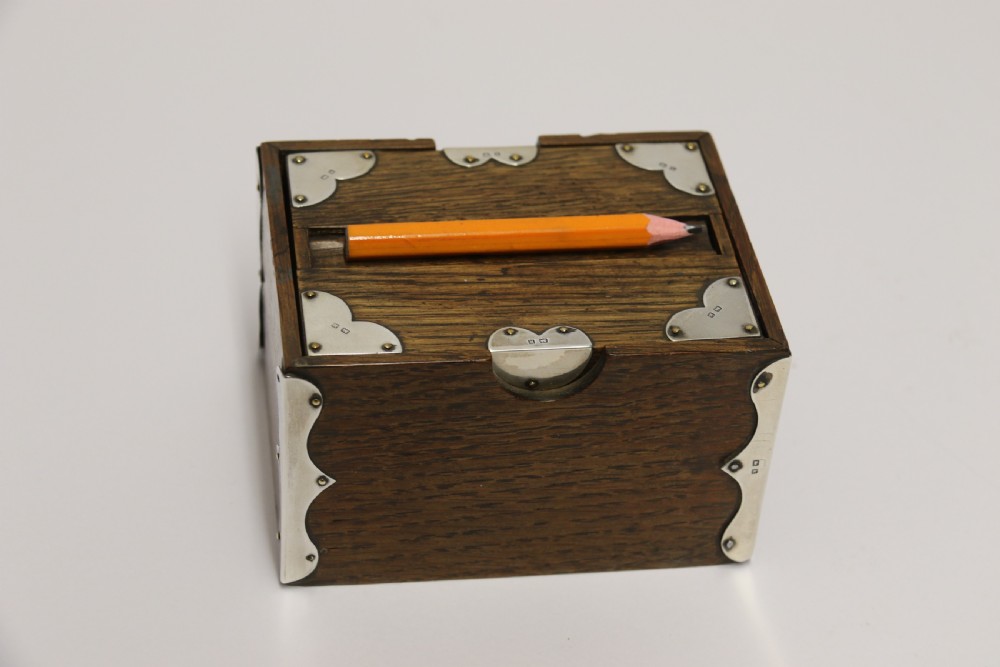 A small Edwardian silver mounted oak bridge pencil box 1909 - 10 View VII