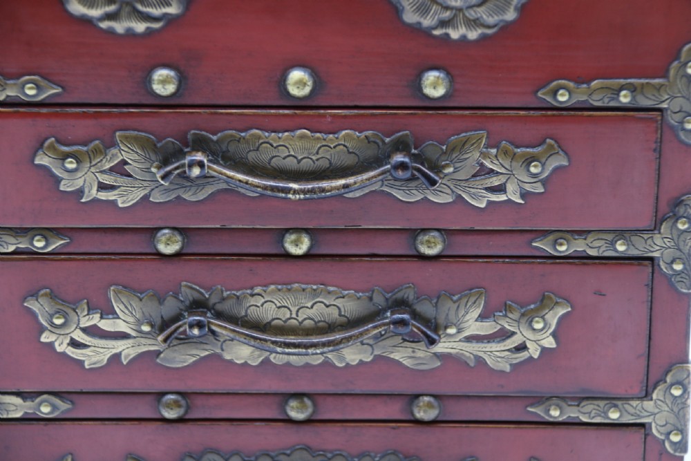 A superb late 19th century Japanese red lacquer and bronze mounted collectors or jewellery cabinet. View XVI
