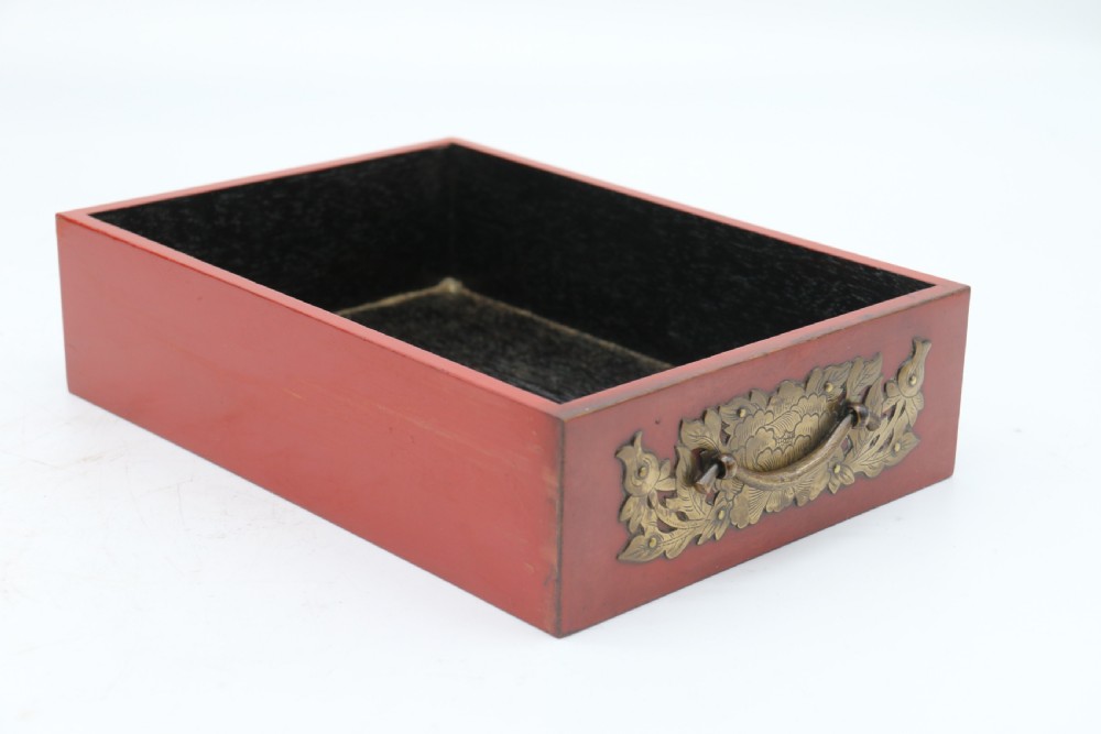 A superb late 19th century Japanese red lacquer and bronze mounted collectors or jewellery cabinet. View XXVIII