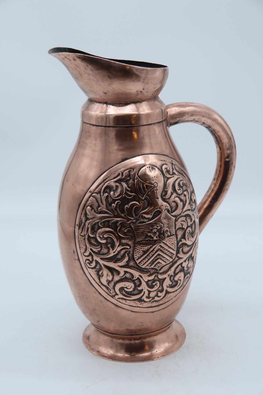 A large baronial copper ale or cider jug from the arts and crafts period, circa 1890