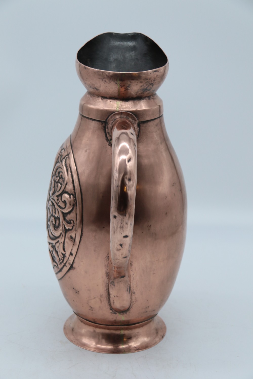 A large baronial copper ale or cider jug from the arts and crafts period, circa 1890 View V