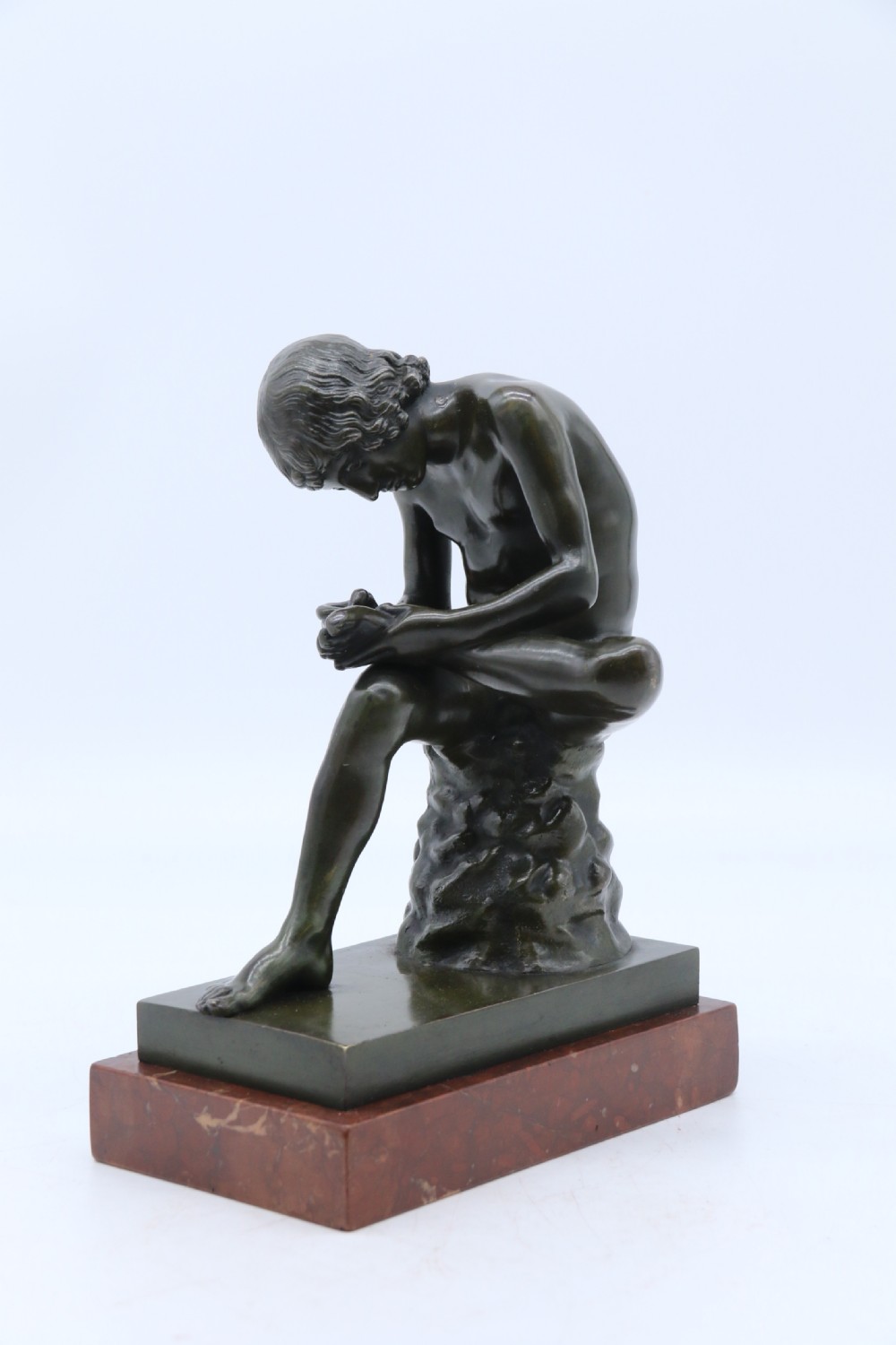 A fine 19th century Italian Grand Tour bronze figure of Spinario, the boy with the thorn.