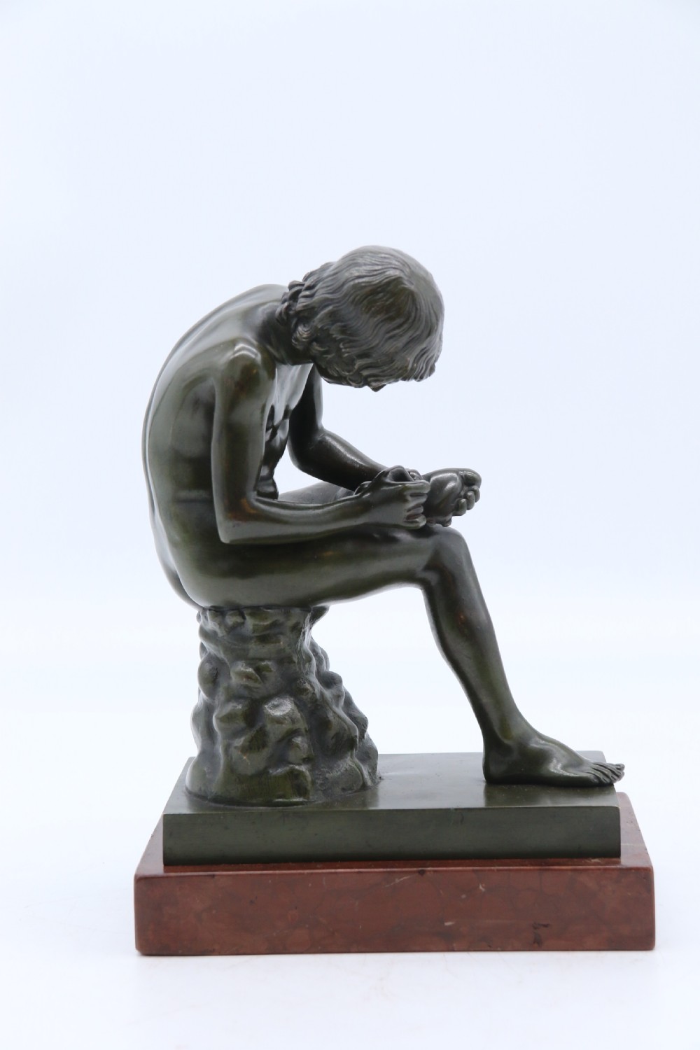 A fine 19th century Italian Grand Tour bronze figure of Spinario, the boy with the thorn. View VI