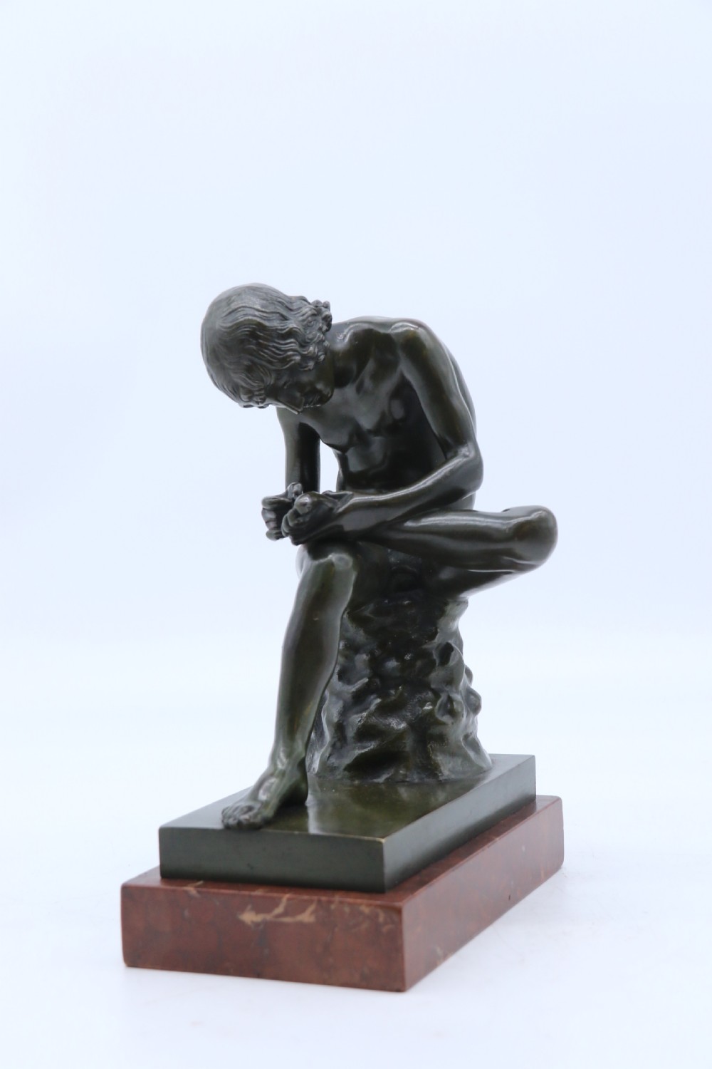 A fine 19th century Italian Grand Tour bronze figure of Spinario, the boy with the thorn. View IX
