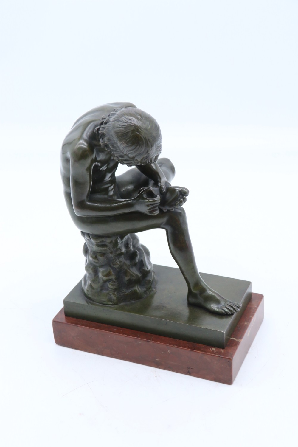 A fine 19th century Italian Grand Tour bronze figure of Spinario, the boy with the thorn. View XII