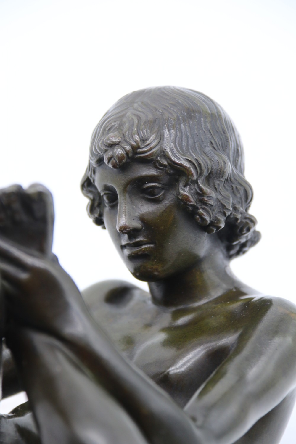 A fine 19th century Italian Grand Tour bronze figure of Spinario, the boy with the thorn. View XIII