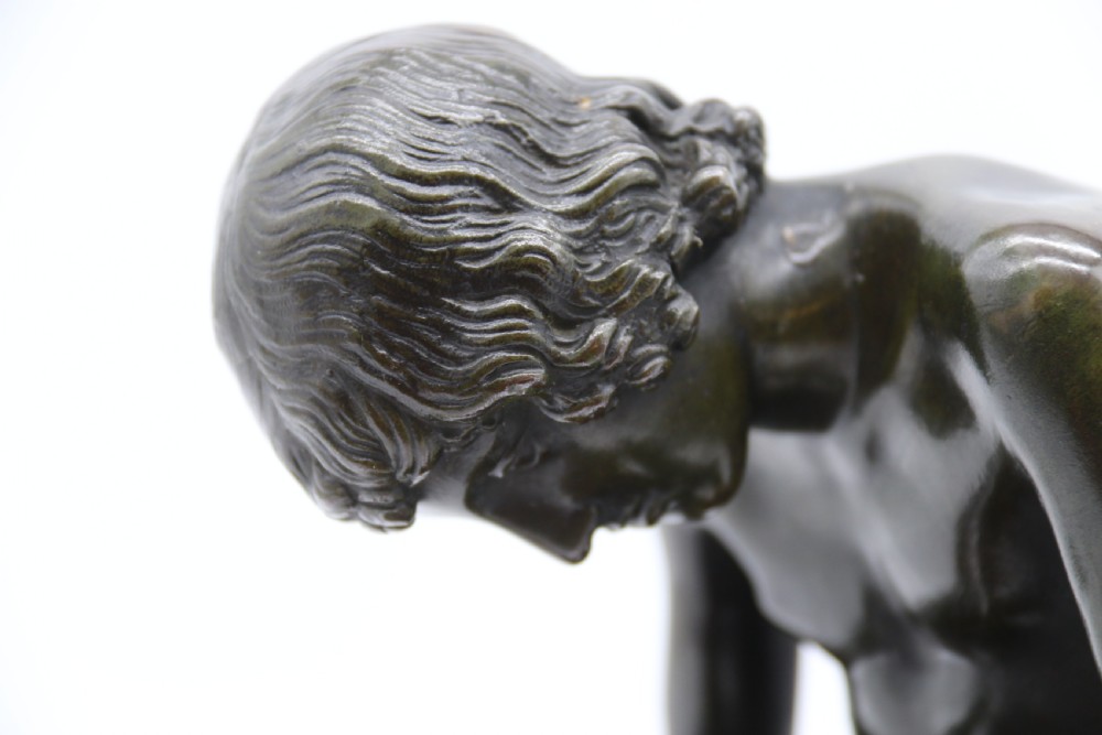 A fine 19th century Italian Grand Tour bronze figure of Spinario, the boy with the thorn. View XX