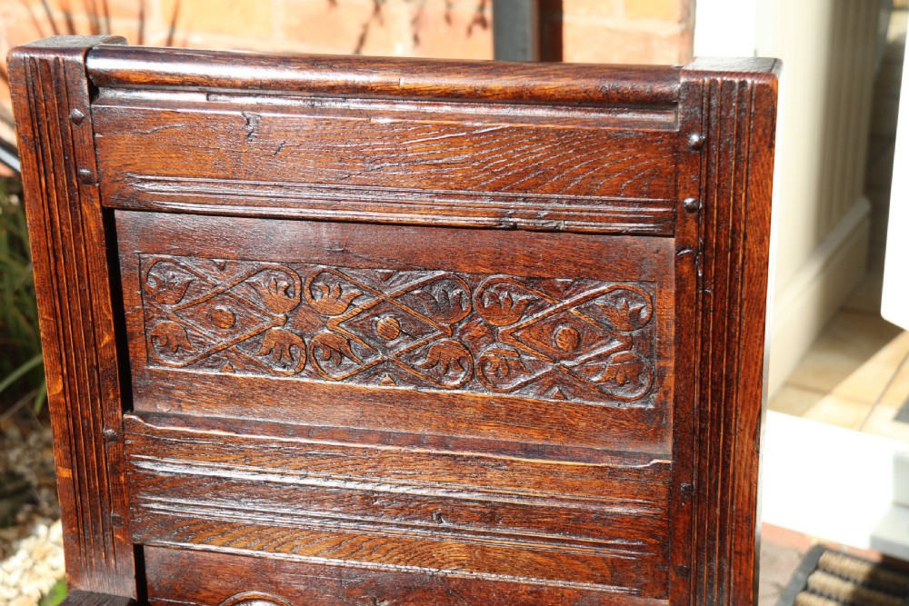 A fine English oak panelled and moulded Wainscot Armchair. View III