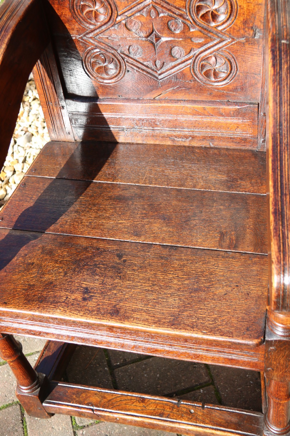 A fine English oak panelled and moulded Wainscot Armchair. View VIII