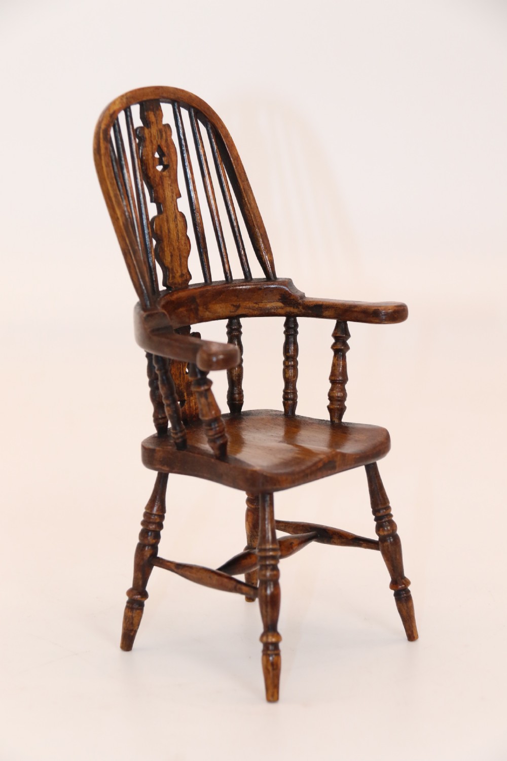 An exceptional miniature country Windsor arm chair, Circa 1900 View V