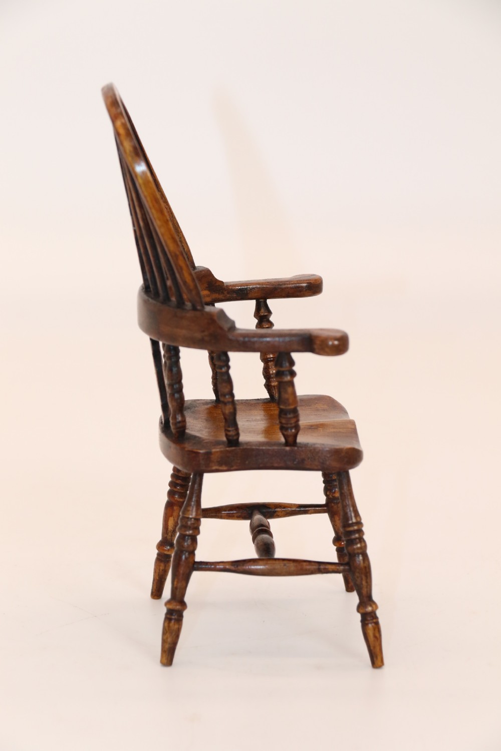 An exceptional miniature country Windsor arm chair, Circa 1900 View VI