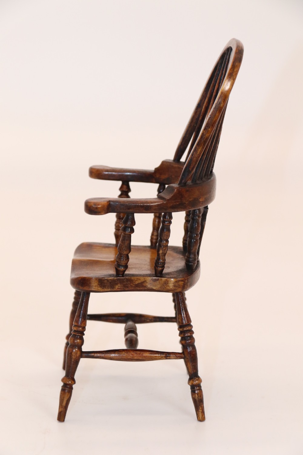 An exceptional miniature country Windsor arm chair, Circa 1900 View X