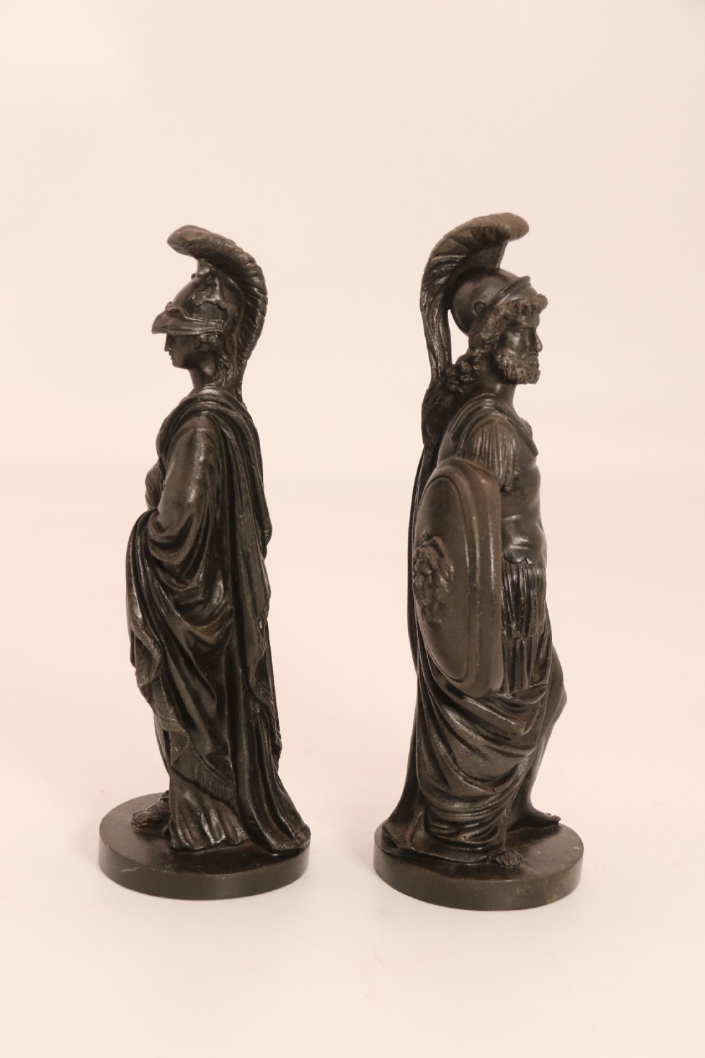 A pair of dark patinated bronze classical figures depicting Athena and Zeus on circular bases. View VII