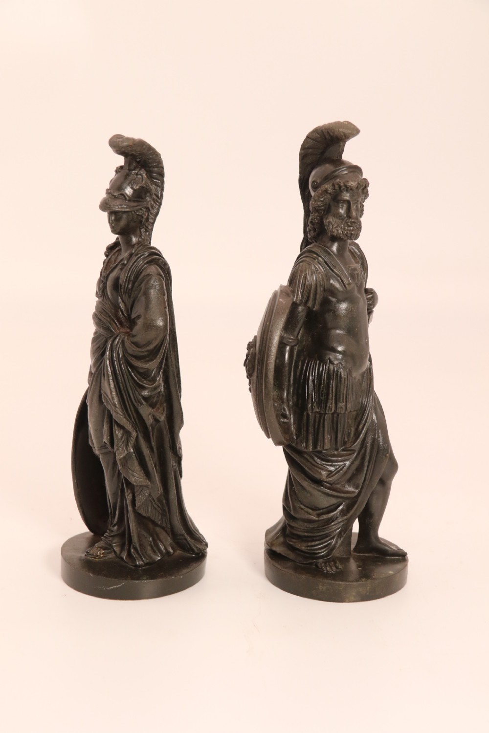 A pair of dark patinated bronze classical figures depicting Athena and Zeus on circular bases. View VIII