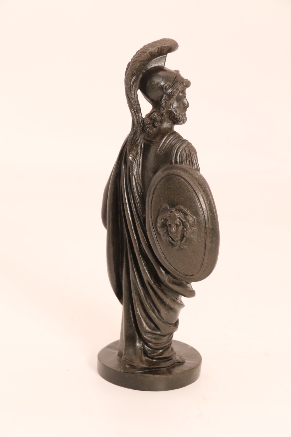 A pair of dark patinated bronze classical figures depicting Athena and Zeus on circular bases. View XII