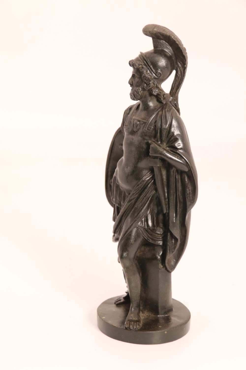 A pair of dark patinated bronze classical figures depicting Athena and Zeus on circular bases. View XVI