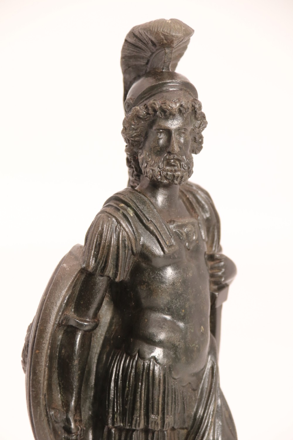 A pair of dark patinated bronze classical figures depicting Athena and Zeus on circular bases. View XVII