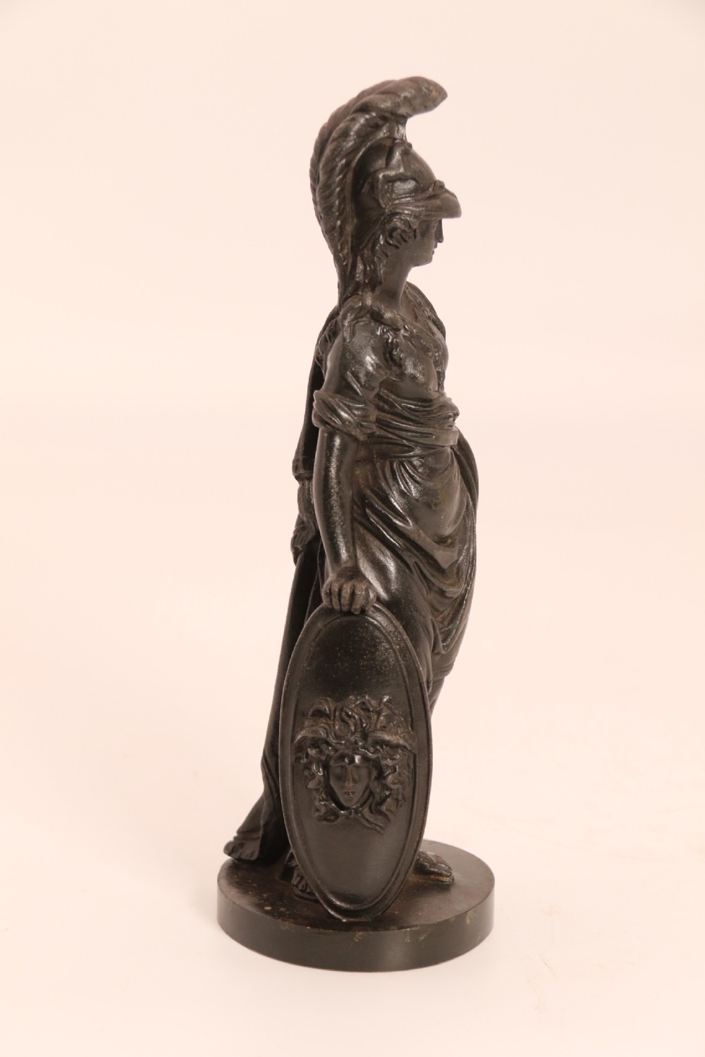A pair of dark patinated bronze classical figures depicting Athena and Zeus on circular bases. View XXII