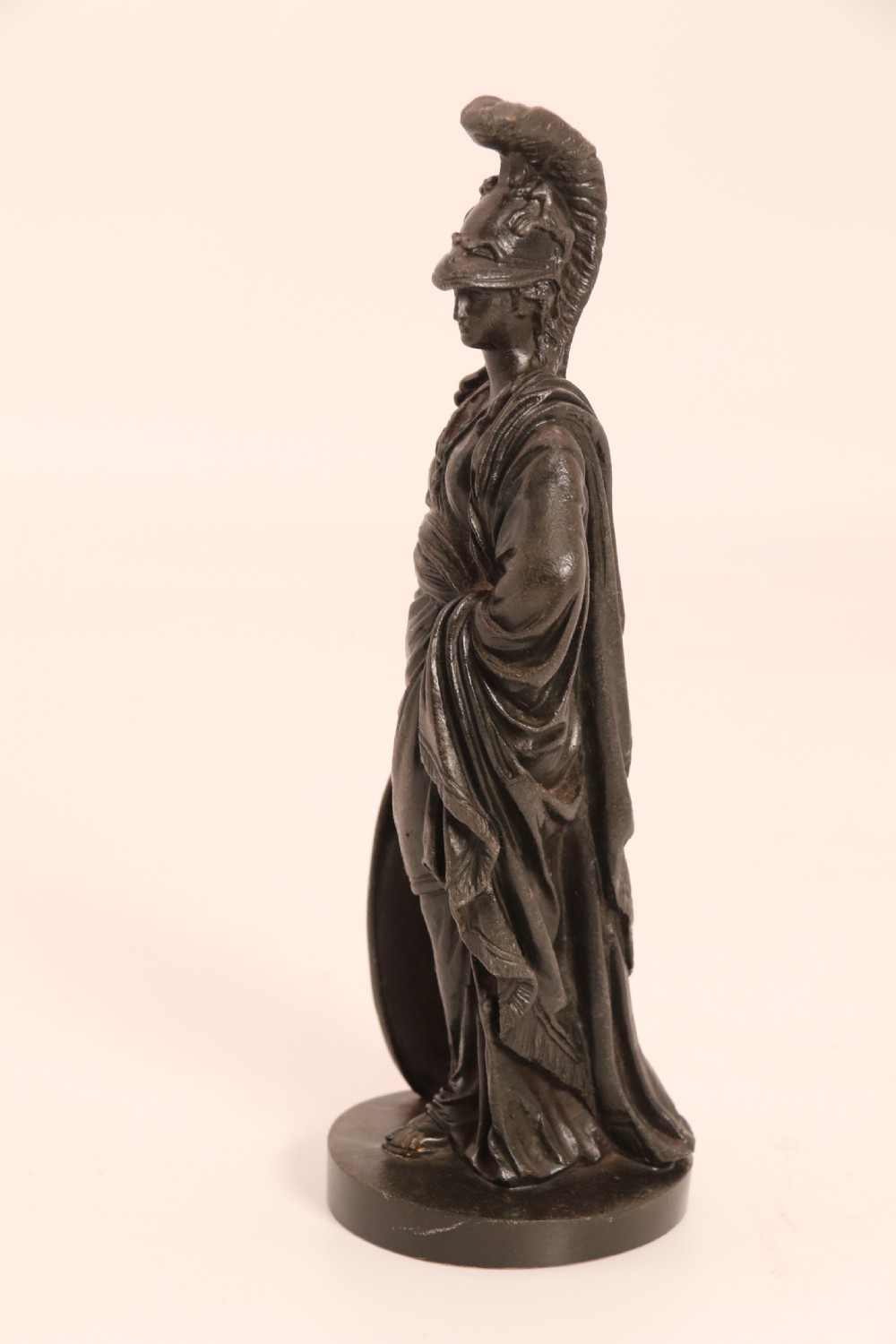 A pair of dark patinated bronze classical figures depicting Athena and Zeus on circular bases. View XXVI