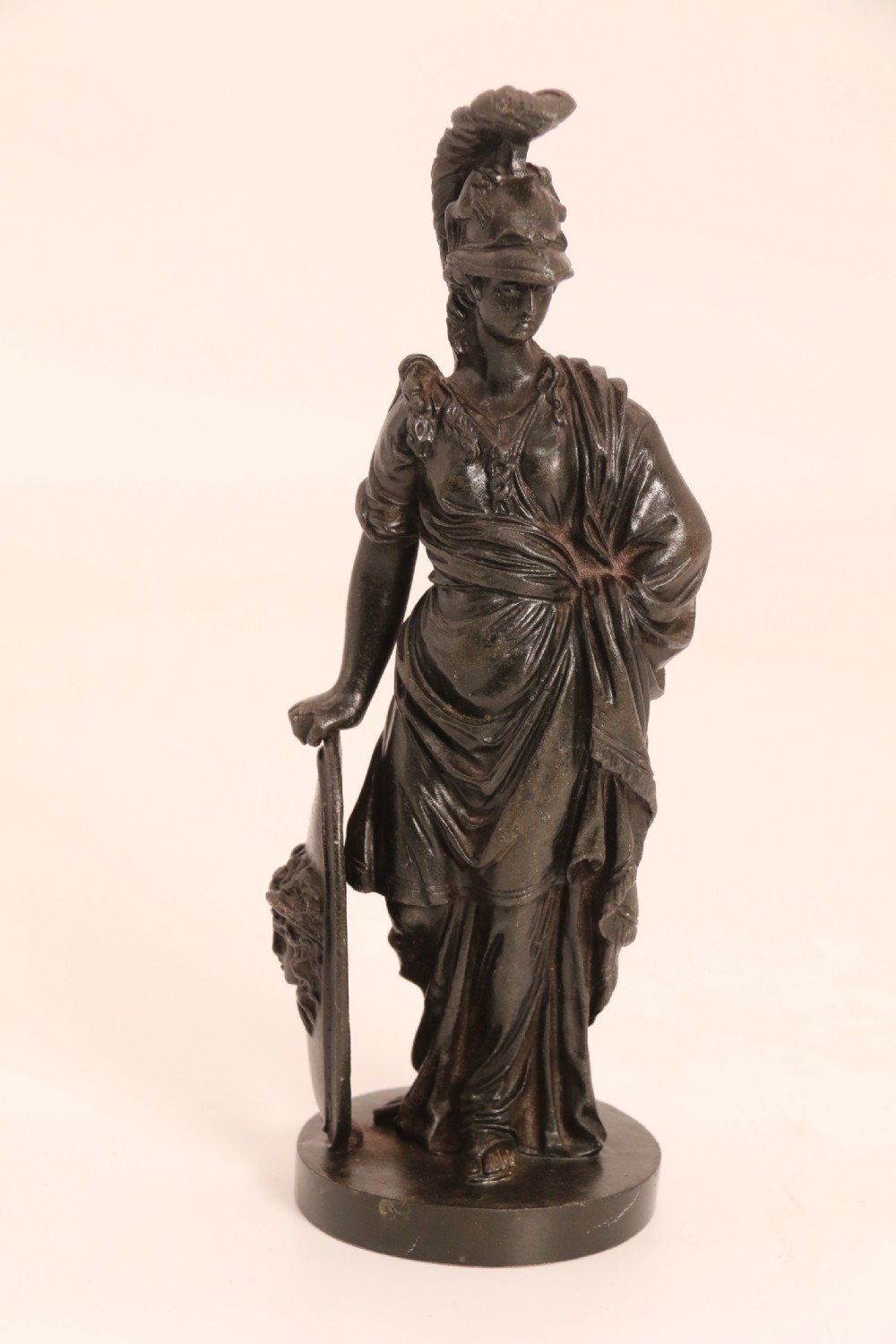 A pair of dark patinated bronze classical figures depicting Athena and Zeus on circular bases. View XXVII