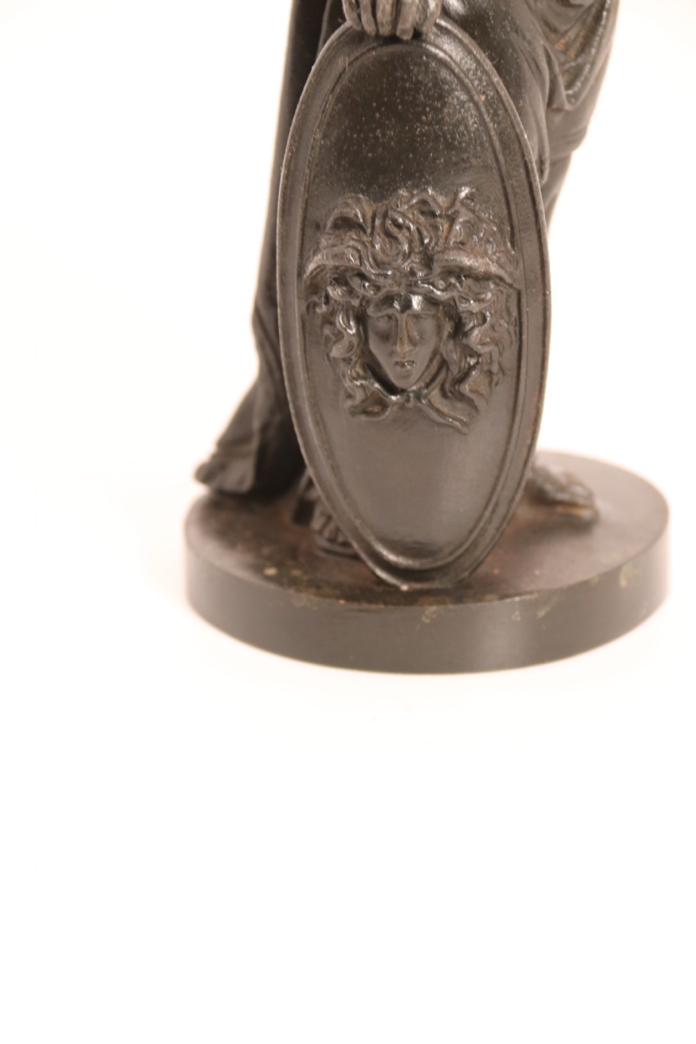 A pair of dark patinated bronze classical figures depicting Athena and Zeus on circular bases. View XXVIII