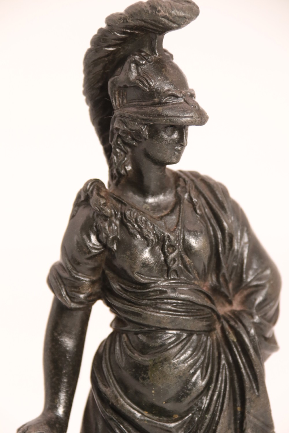 A pair of dark patinated bronze classical figures depicting Athena and Zeus on circular bases. View XXIX