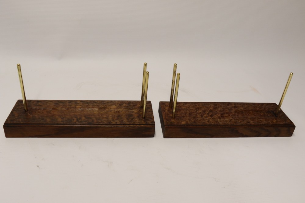 A rare pair of early 20th century model sailing ships in bottles displayed on wooden stands View XIII