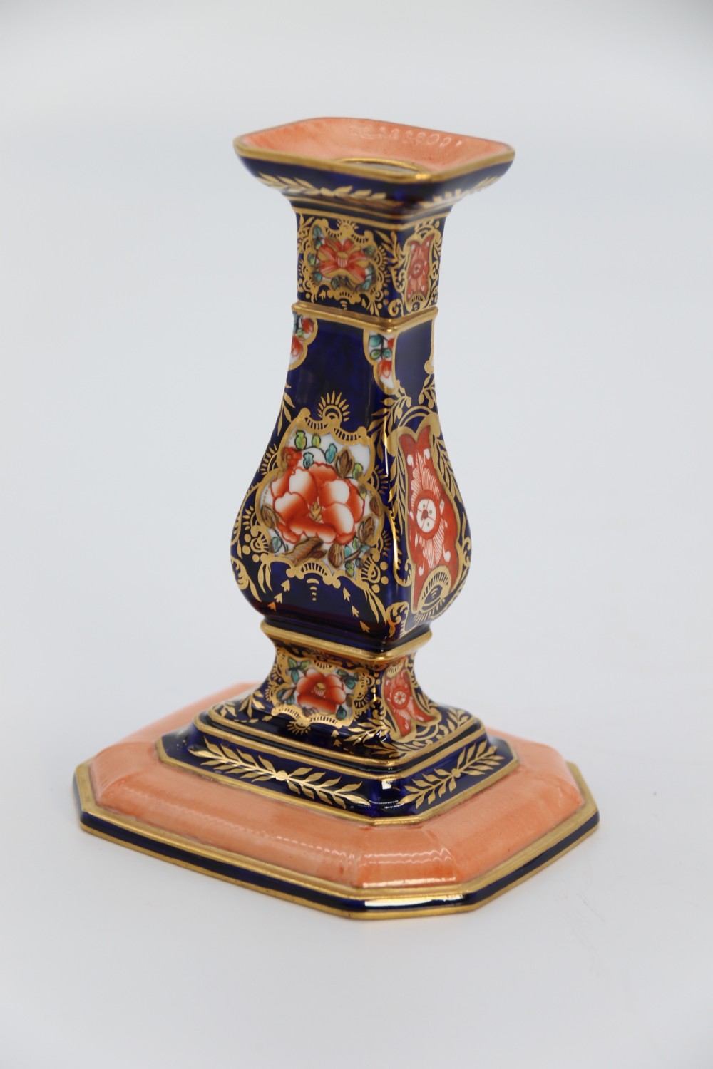 A rare pair of Royal Crown Derby hand painted porcelain candle sticks.

 View IX