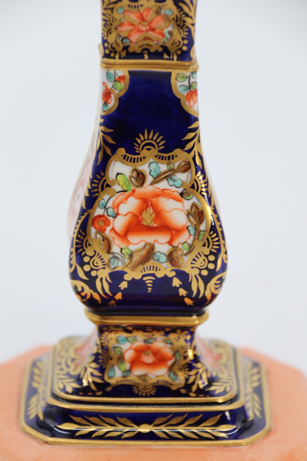 A rare pair of Royal Crown Derby hand painted porcelain candle sticks.

 View XVI