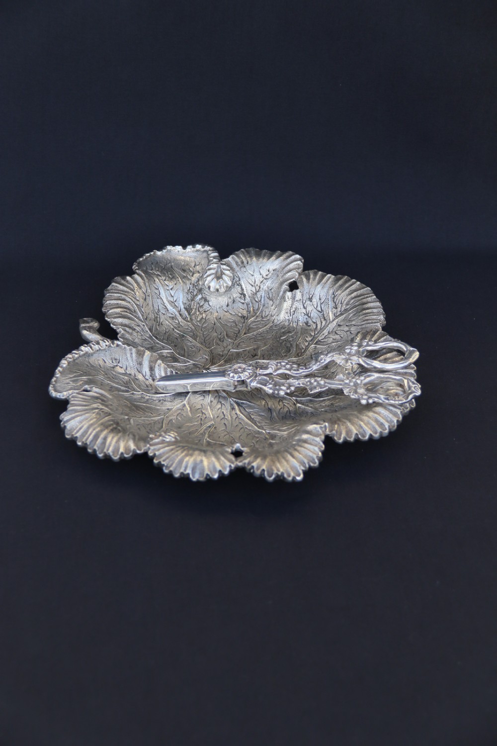 A rare late 19th century silver plated and hand engraved grape salver with matching grape scissors. View VIII